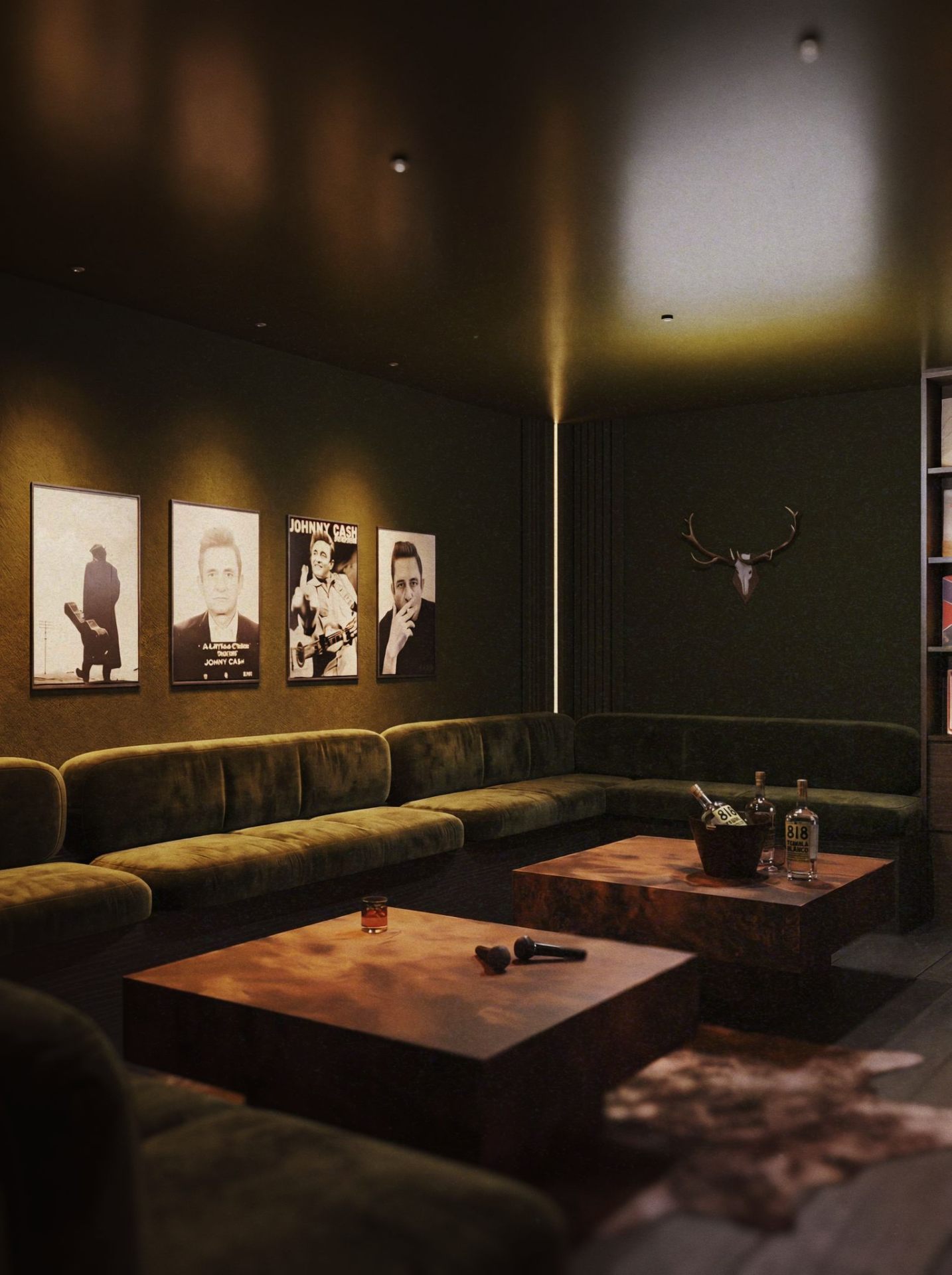 The Johnny Cash Room, a dark green velvet lounge with framed black and white Johnny Cash portraits and burl wood tables